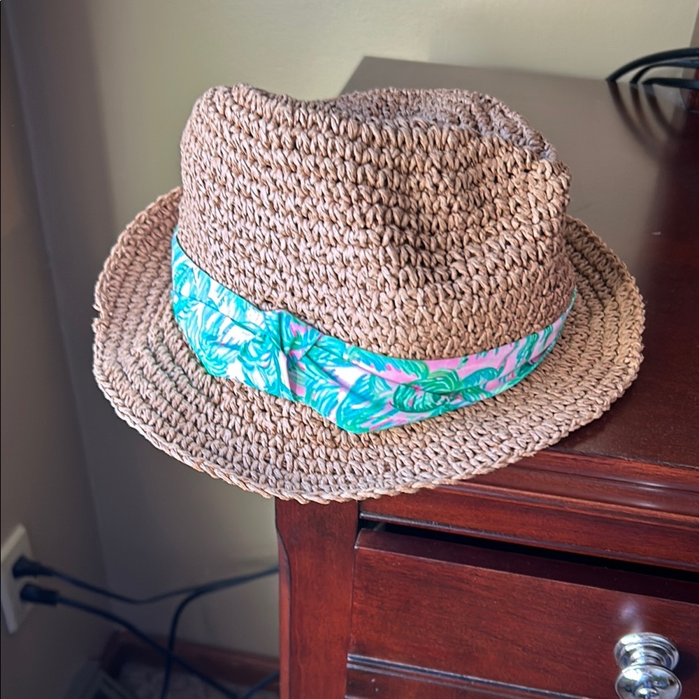 Women’s straw hat by Lilly Pulitzer 
Pink and green. Palm tree design.